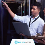 IT Support professional pointing out hardware systems to hardware as a service client.