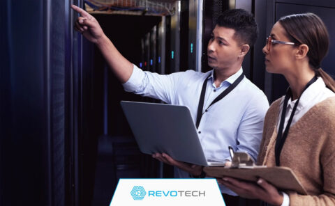 IT Support professional pointing out hardware systems to hardware as a service client.
