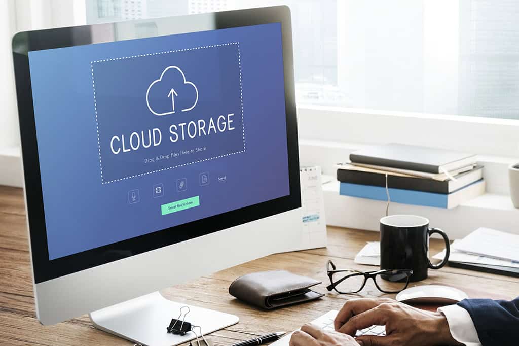 A nonprofit leader uploads files to share on a cloud server