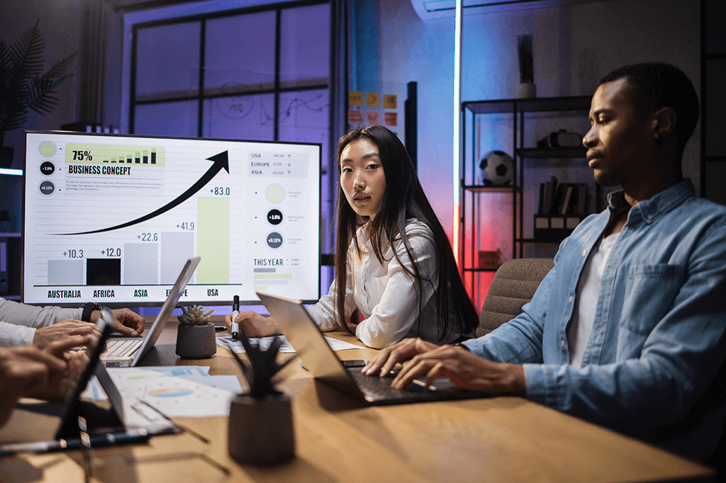 Vancouver business executives analysing financial growth at the office